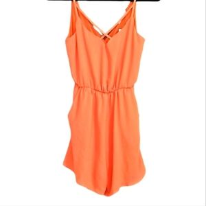 LUSH tangerine short romper. Size XS NWT